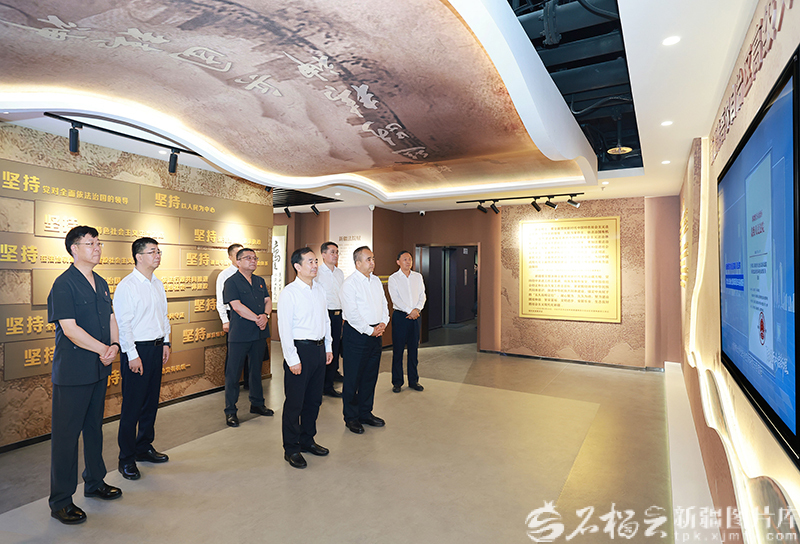 陈小江艾尔肯·吐尼亚孜在自治区高级人民法院和自治区人民检察院调研座谈